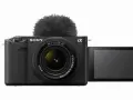 Czarny aparat Sony Alpha z obiektywem i mikrofonem na gorącej stopce. Idealny do vlogowania, model zve1.